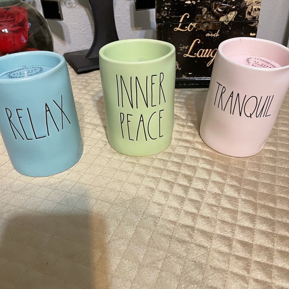 Three Rae Dunn fragrant candles.